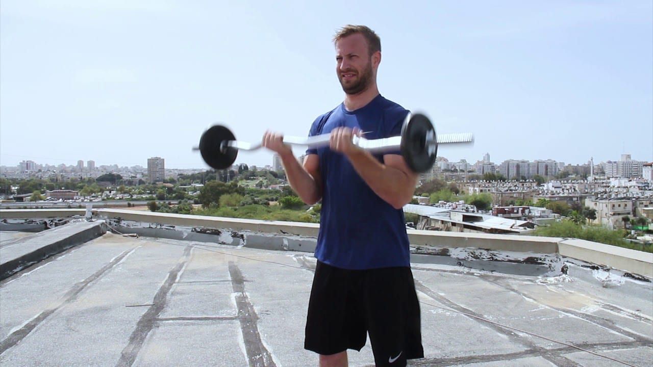 כפיפות מרפקים עם מוט בעמידה – Standing Barbell Biceps Curl